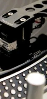 Close-up of a vintage turntable needle on a vinyl record.