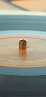 Close-up of a vintage turntable playing a vinyl record.