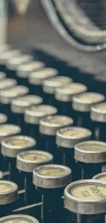 Close-up of vintage typewriter keys with rustic charm.