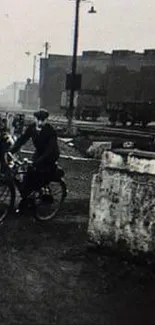 Black and white photograph of a vintage urban railway scene.