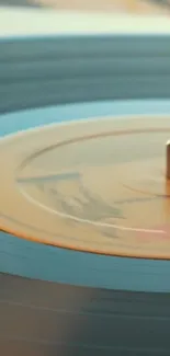 Close-up of a spinning vintage vinyl record on a turntable.