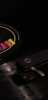 A close-up of a vintage vinyl record player with a colorful label.