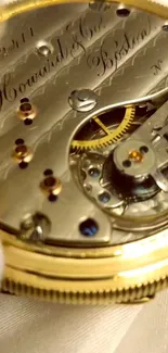 Close-up of a vintage watch mechanism with intricate gold details.