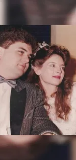 Vintage wedding couple in elegant attire.