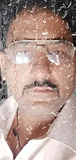 Man with glasses in a vintage workshop setting.