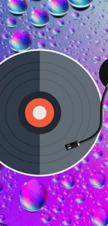 Vinyl record with purple and blue droplet background.