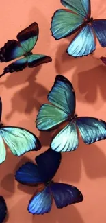 Vibrant blue butterflies on a peach background.