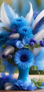 Vibrant blue floral bouquet with feathers and greenery for a stylish wallpaper.