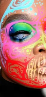 Vibrant face art with bold colors and patterns, perfect as a mobile wallpaper.