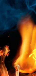 Dynamic wallpaper with flames and blue smoke.