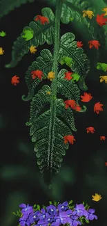 Green leaf with colorful falling petals and flowers.