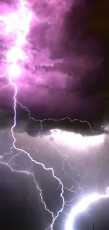 Purple lightning storm over a dark cloudy sky, creating a vivid visual scene.