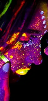 Vibrant neon face art with glowing colors.