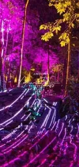 Vivid neon forest with pink and purple lights creating an ethereal ambiance.