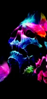 Vibrant neon skull with colorful floral accents on black background.