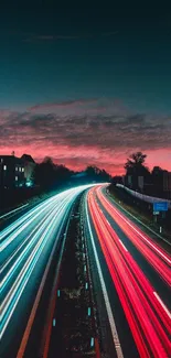 Vivid highway lights with sunset sky.