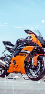 Vivid orange sports bike with futuristic design on a sunny day.