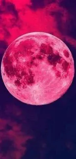 Pink moon against a dark sky mobile wallpaper.