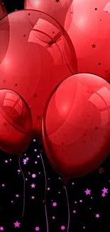 Vibrant red balloons with starry accents on a dark background.