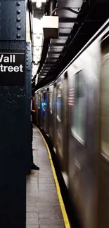 Wall Street subway station with moving train.