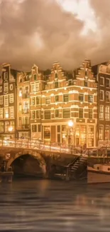 Warm-toned evening view of Amsterdam canal with illuminated buildings.