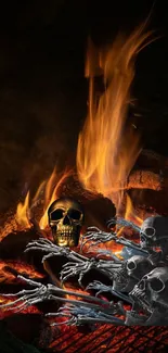 Mobile wallpaper featuring a warm, glowing campfire at night.