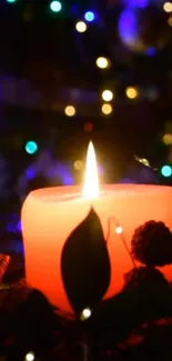 A glowing red candle with colorful bokeh in the background, creating a warm ambiance.