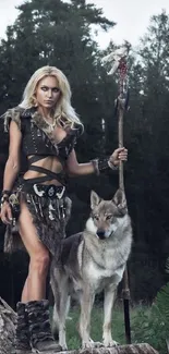 Warrior woman standing with wolf in dark forest.