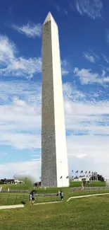 Washington Monument under a blue sky with clouds, perfect mobile wallpaper.