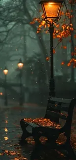 Illuminated park bench under autumn streetlamps at night.