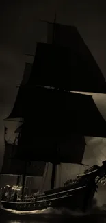 Silhouette of a pirate ship sailing on a dark, moody ocean.