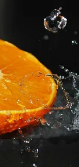 Orange slice with water droplets on dark background.