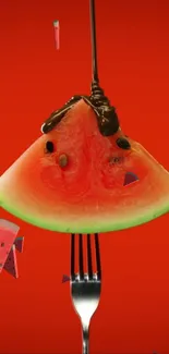 Watermelon slice on fork with chocolate drizzle on red background.