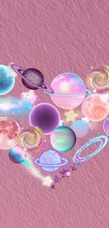 Heart-shaped cosmic design with colorful planets on a pink background.