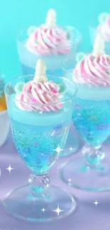 Whimsical pastel dessert display in elegant glasses.