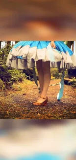 Whimsical scene of a blue dress in forest