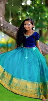 Girl in bright dress sitting on a tree in forest setting.