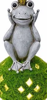 Whimsical frog statue on a green grass-like sphere, perfect for nature lovers.