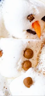 Cute snowman marshmallow floating in hot cocoa.