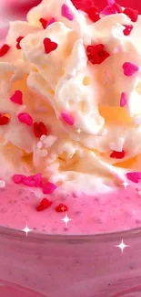 Pink dessert wallpaper with whipped cream and heart sprinkles.