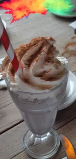 Whipped cream milkshake with vibrant colors and a red straw.