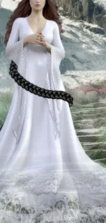 Woman in white gown with black sash in mountain setting.