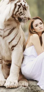 White tiger with a woman in a serene setting on a mobile wallpaper.