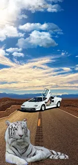 White tiger and sports car on open road under a blue sky.