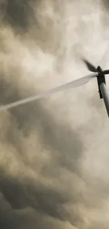 Wind turbine against a dramatic cloudy sky.