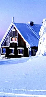 Snow-covered cabin under a pastel winter sky at sunrise.