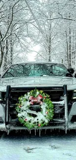 Car with Christmas wreath in snowy forest scene.