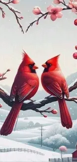 Two red cardinals on a branch with cherry blossoms in a snowy setting.