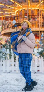 A vibrant carousel in a snowy winter scene with colorful lights and decorations.