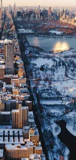 Snow-covered cityscape in winter morning light, with buildings and trees.